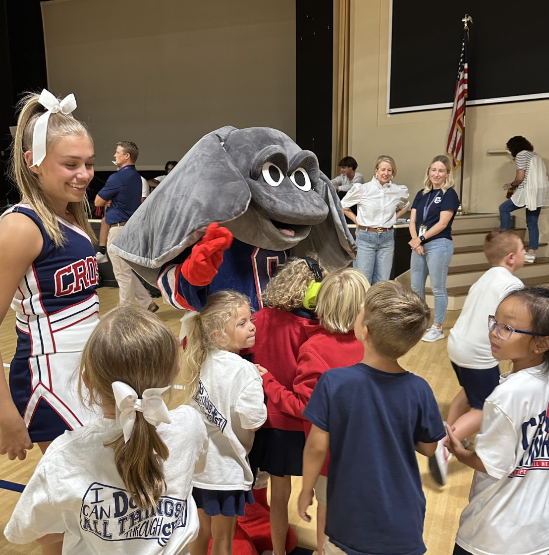 Kindergarteners visit Storm and give him big hugs! 