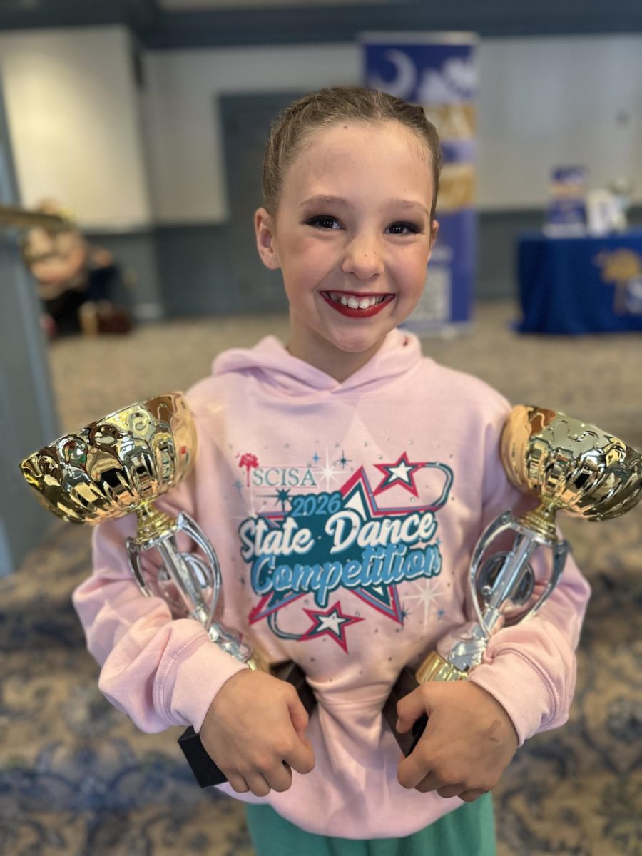 Riley Otwell with her winning trophies, SCISA Dance Competition 2026.